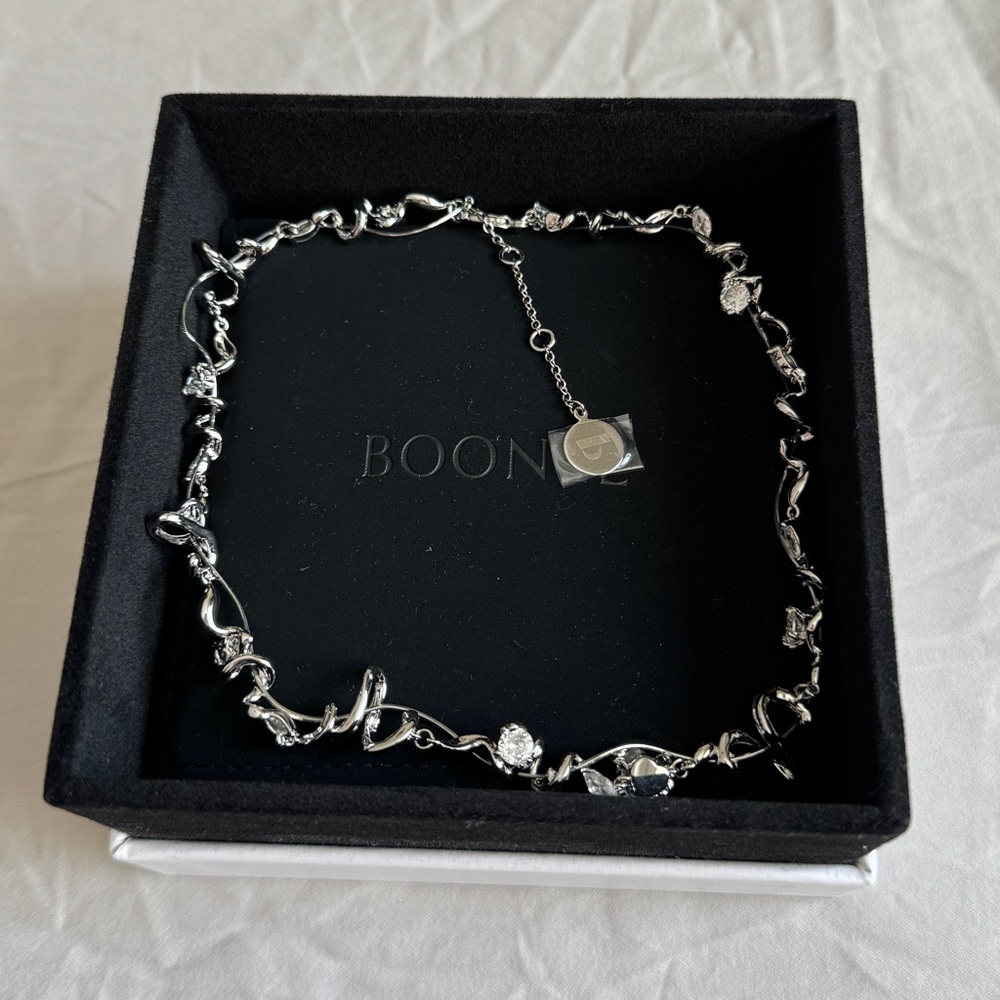 Sliver and diamond necklace